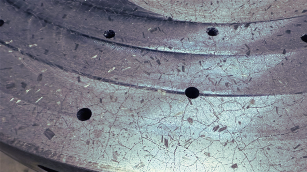 HIT ultrasonic-assisted surface grinding of carbon-ceramic brake disc